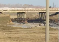 На восстановление размытого моста в Шипуновском районе брошены дополнительные силы