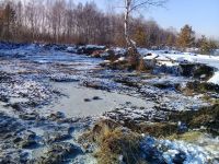 Подготовленный для отбросов котлован