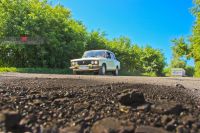 Проехать по дороге стало проще, но в воздухе висит угольная пыль