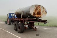 Трактор могло скрыть вездесущей дымкой