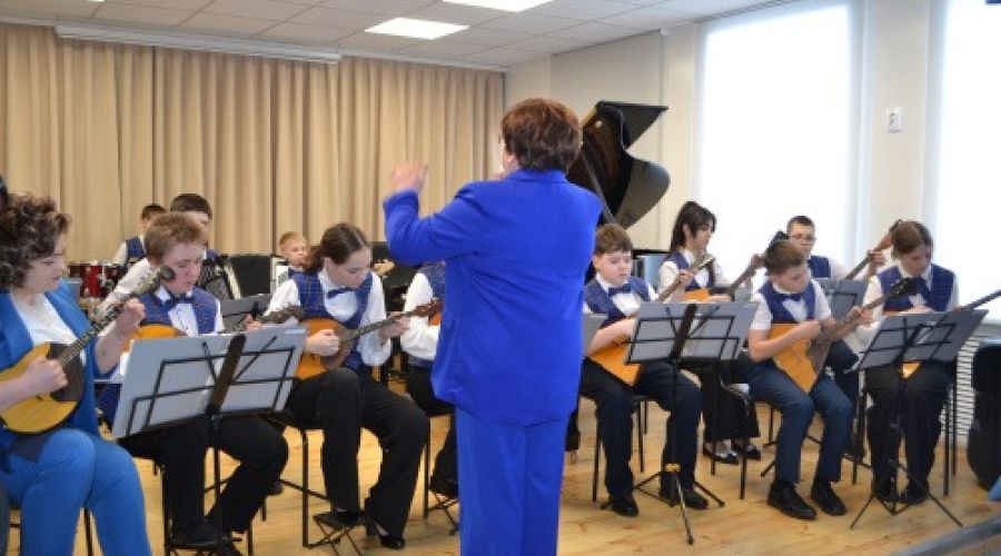 учитель в музыкальной школе